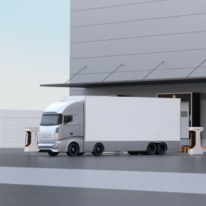 mehrere E-Lkw stehen im Depot und werden gerade geladen